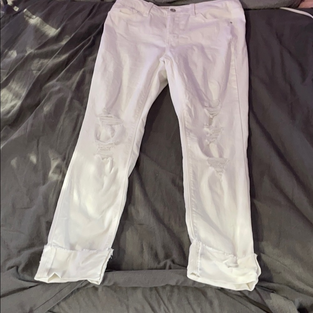 White cuffed ripped jeans